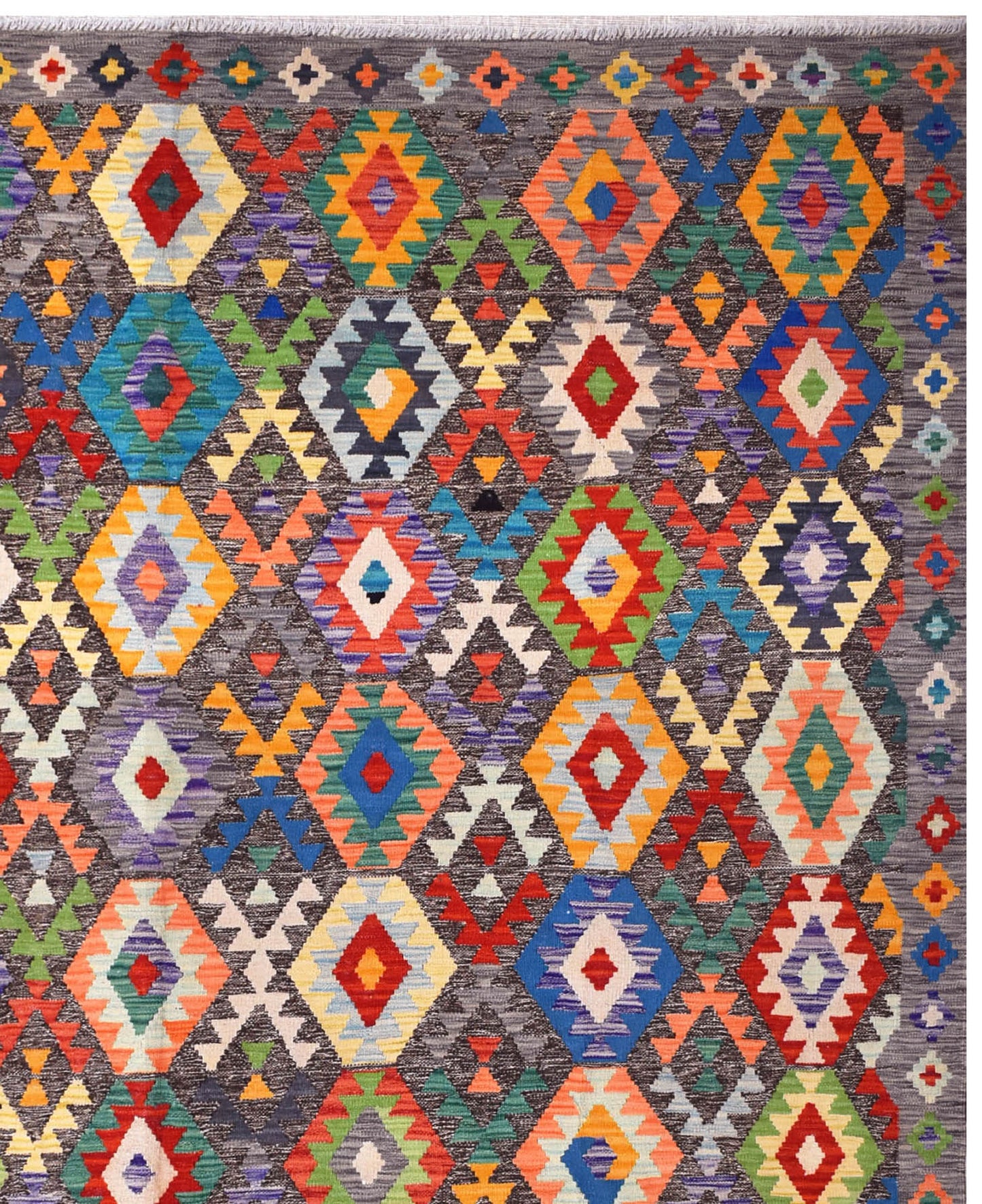 Handmade Afghan Maimana kilim rug featuring a vibrant, multi-colored geometric diamond pattern.