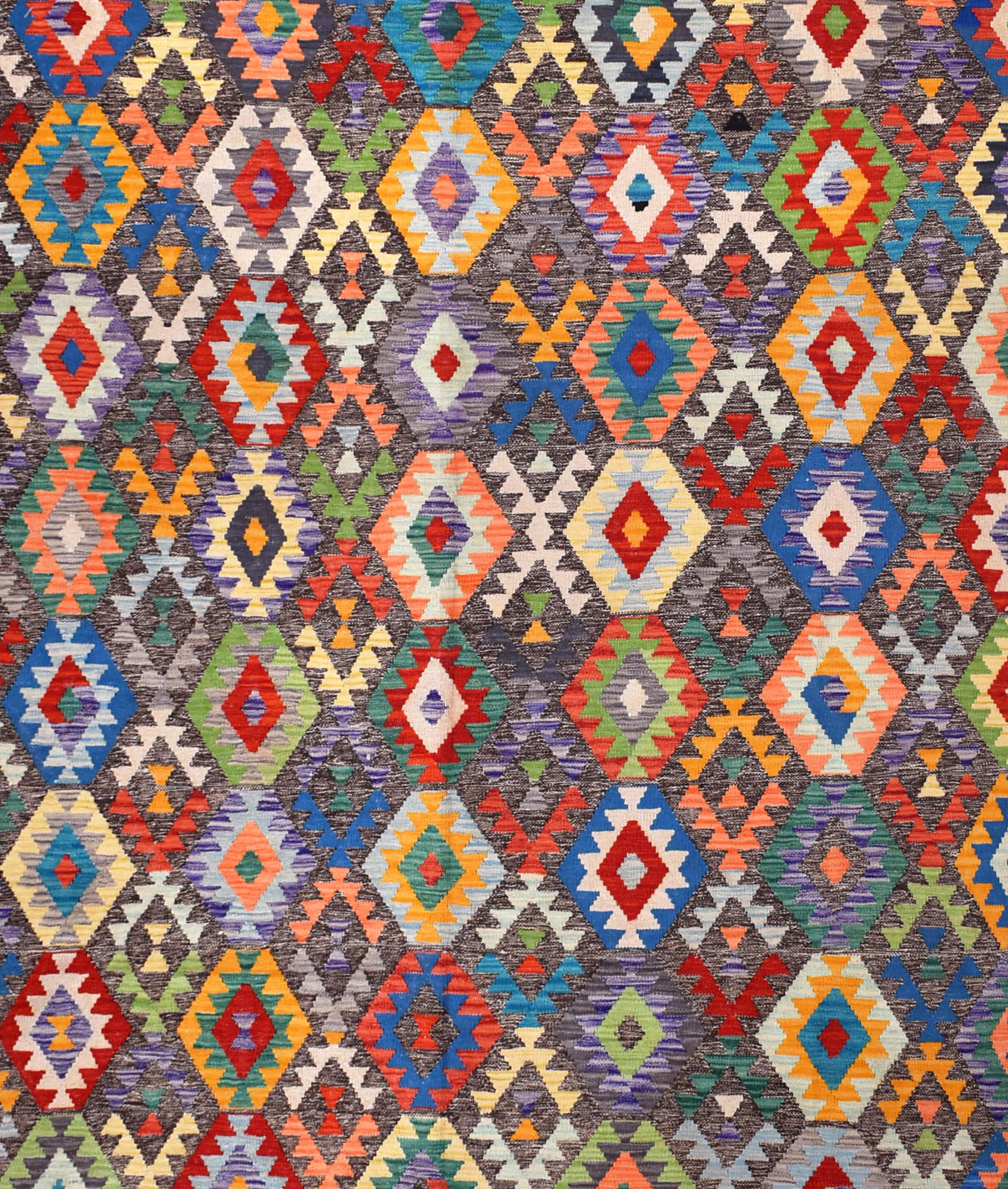 Handmade Afghan Maimana kilim rug featuring a vibrant, repeating geometric diamond pattern.