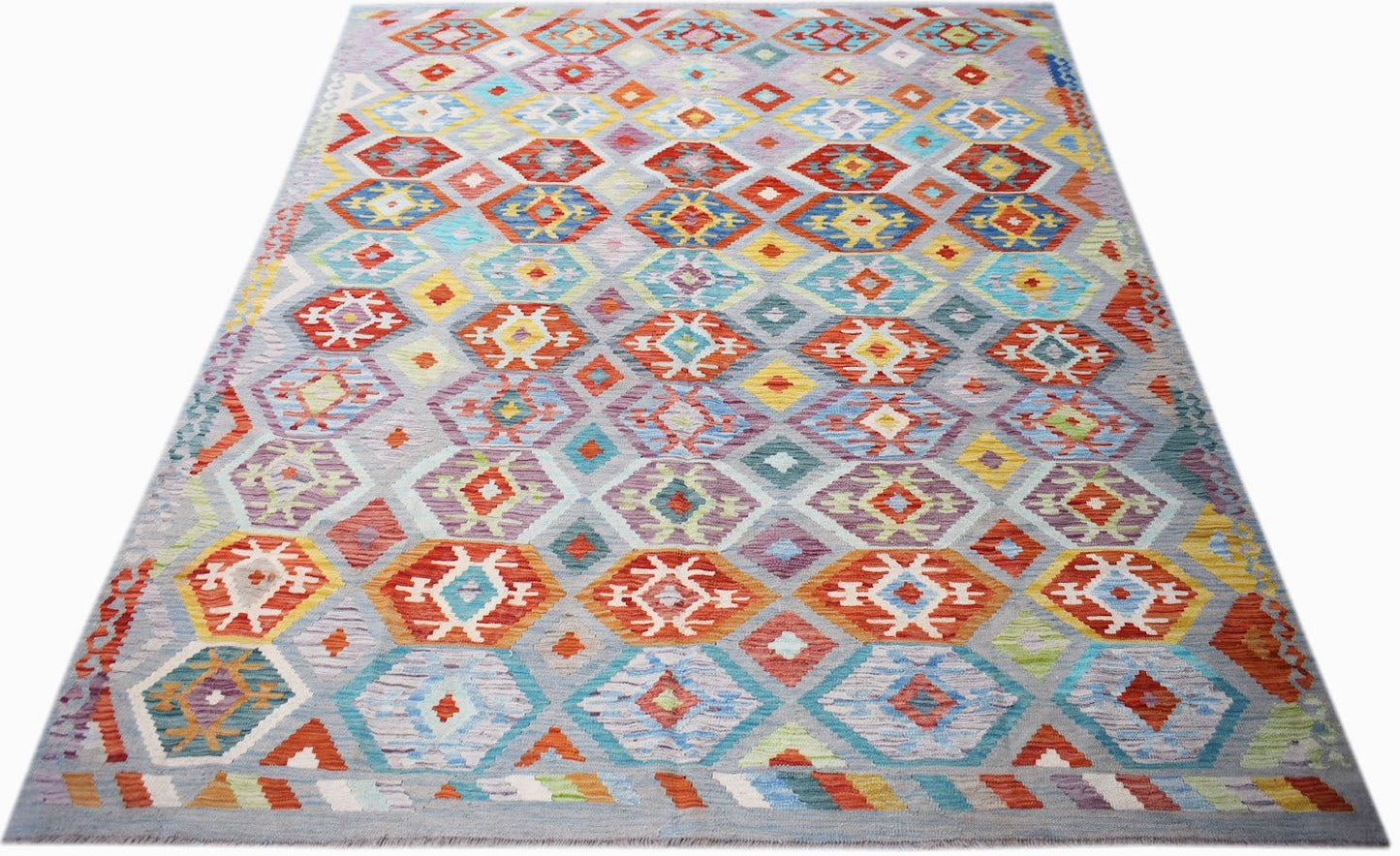 Handwoven Afghan Maimana Kilim rug featuring a colorful geometric diamond pattern on a grey base.