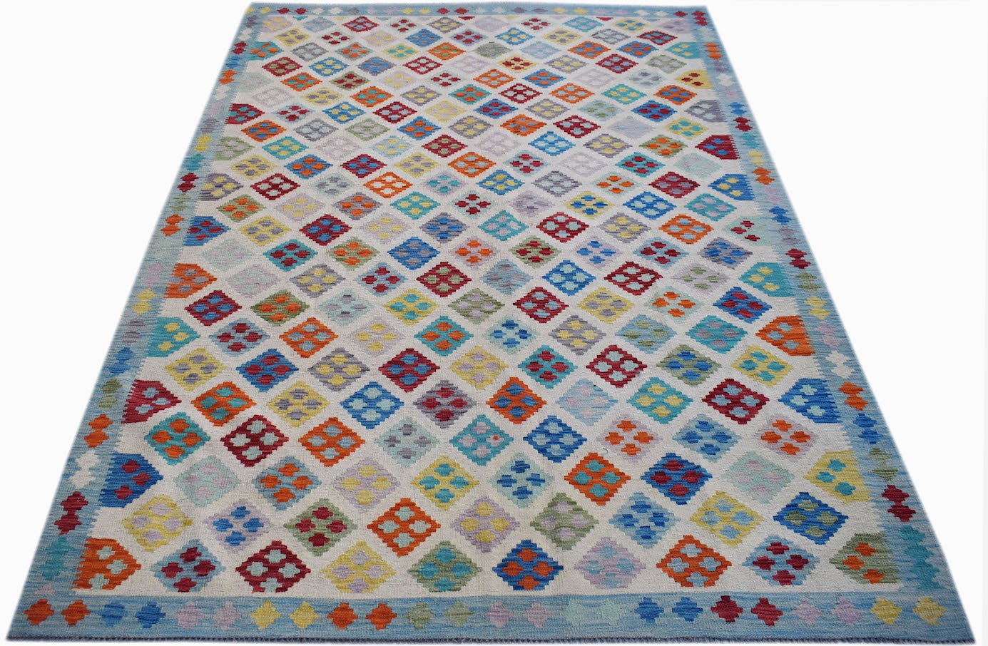 Handmade Afghan Maimana kilim rug featuring a colorful geometric diamond pattern on a light base.