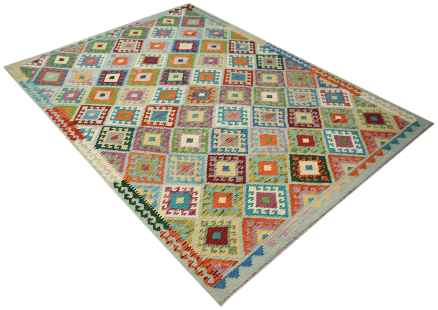Handwoven Afghan Maimana kilim rug featuring a colorful geometric diamond pattern.