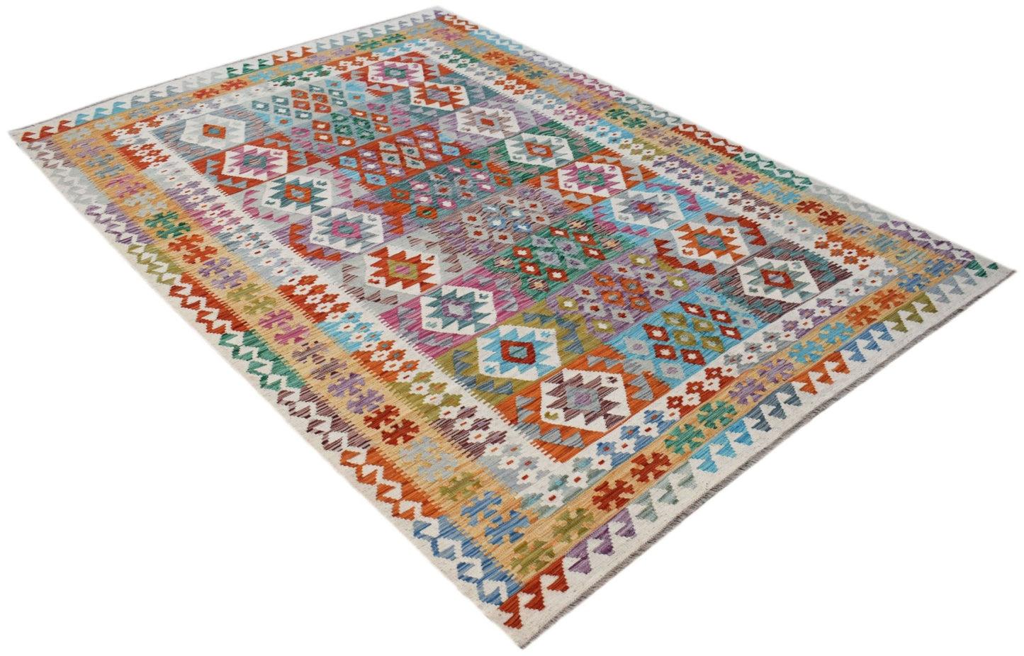 Handwoven Afghan Maimana kilim rug featuring a vibrant, multi-colored geometric pattern.