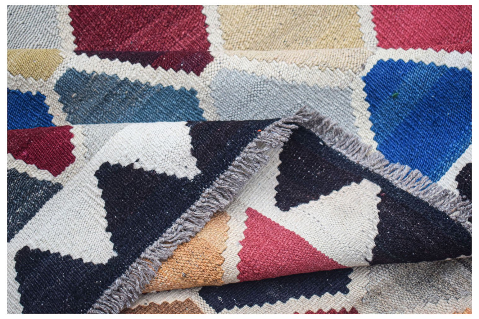 Afghan Maimana Kilim with geometric blocks of color.