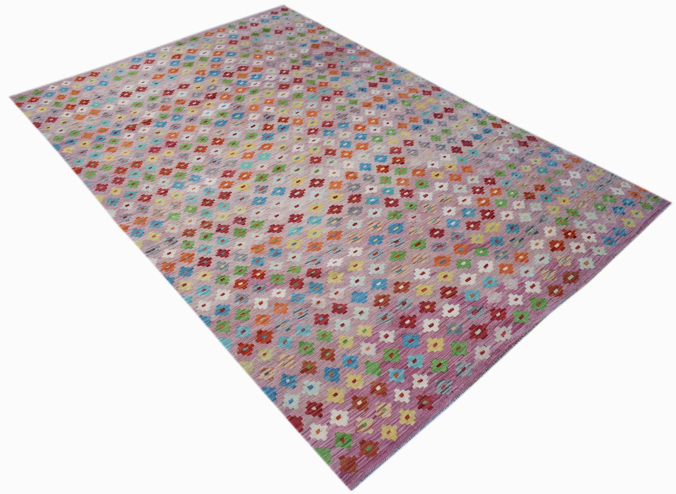 A handmade Afghan Maimana kilim rug featuring a repeating pattern of colorful floral motifs.