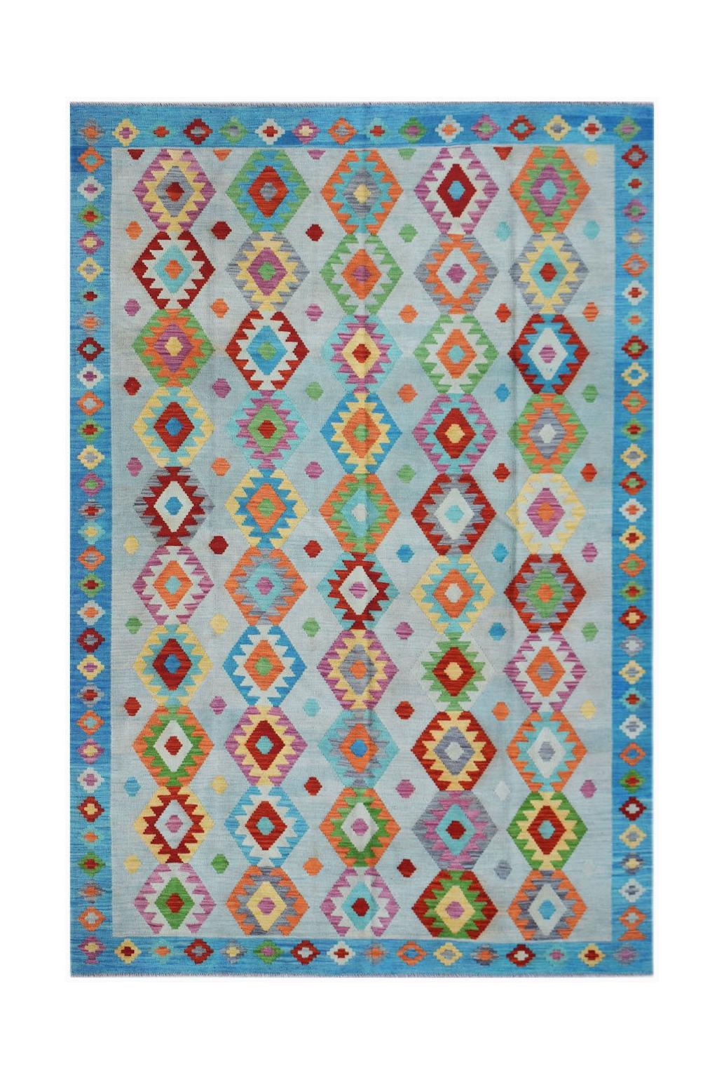Handwoven Afghan Maimana kilim rug featuring a light blue background with colorful geometric motifs.