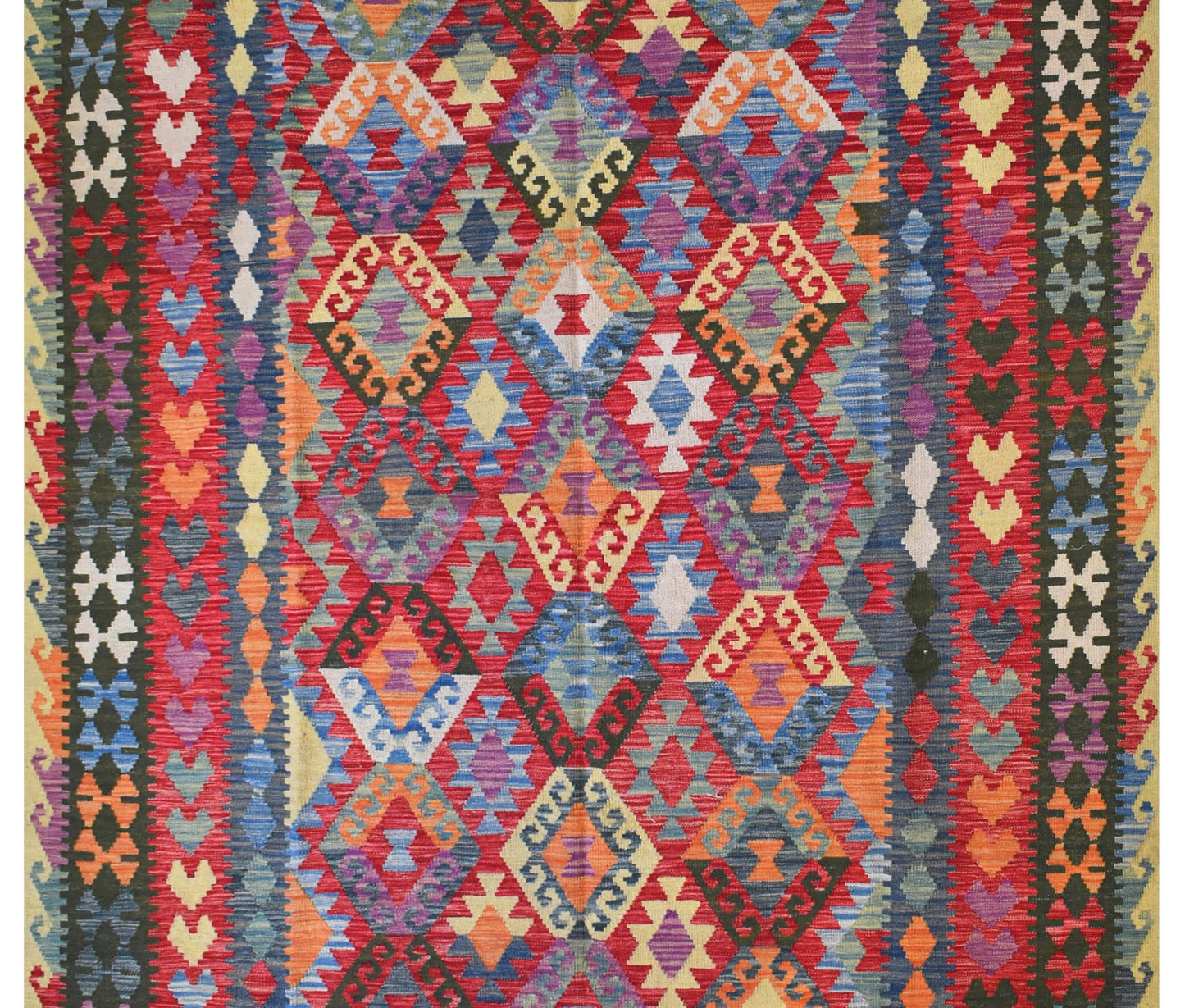 Handmade Afghan Maimana kilim rug featuring a vibrant geometric pattern in rich, multicolored hues.