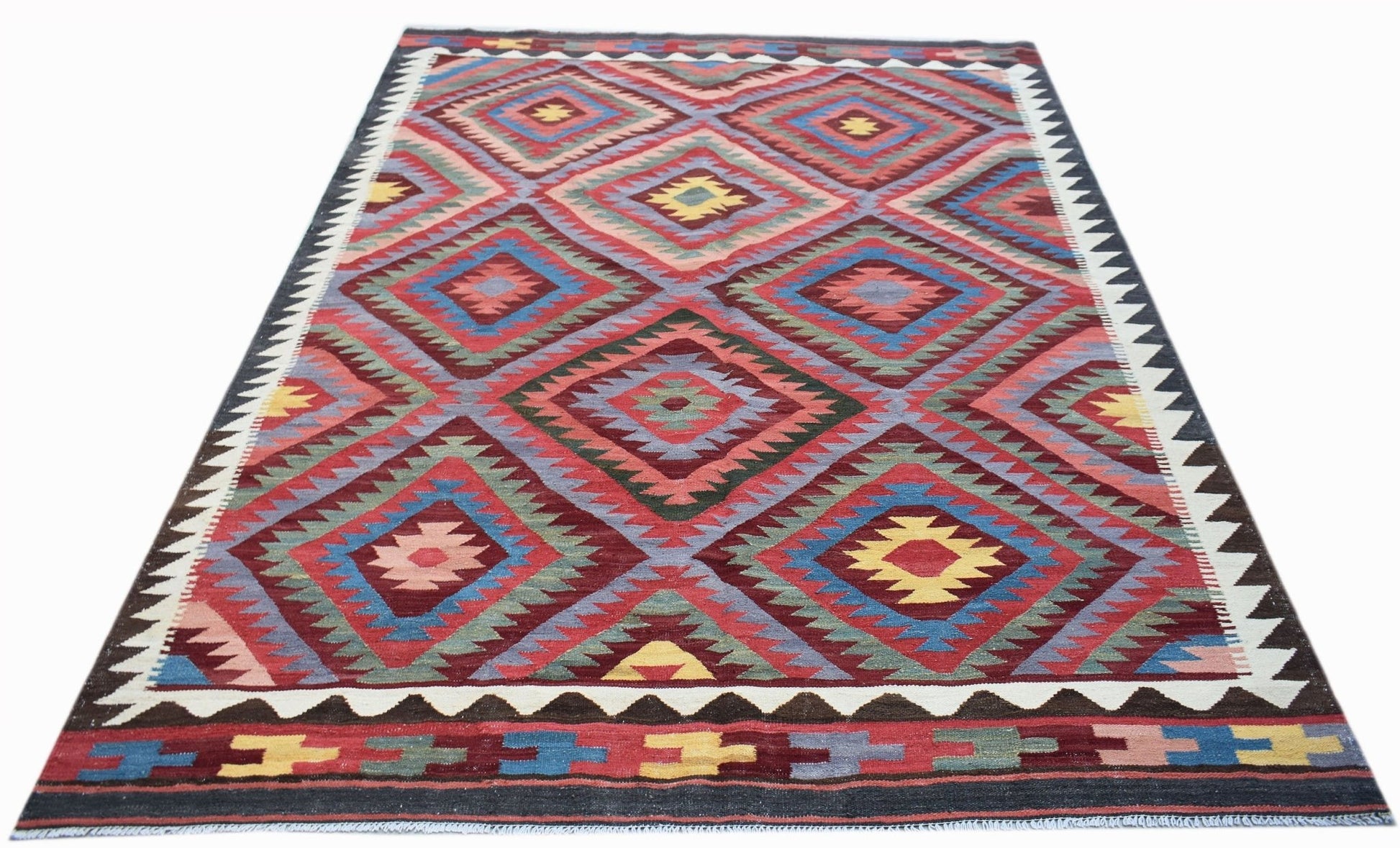 Handwoven Afghan Maimana kilim rug featuring a colorful geometric diamond pattern.