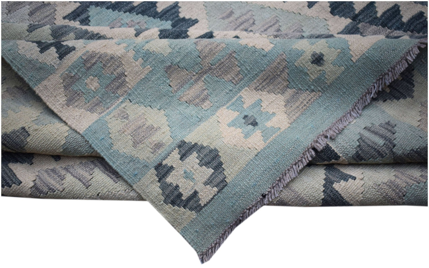 Handwoven Afghan Maimana kilim rug featuring a geometric pattern in shades of blue and grey.