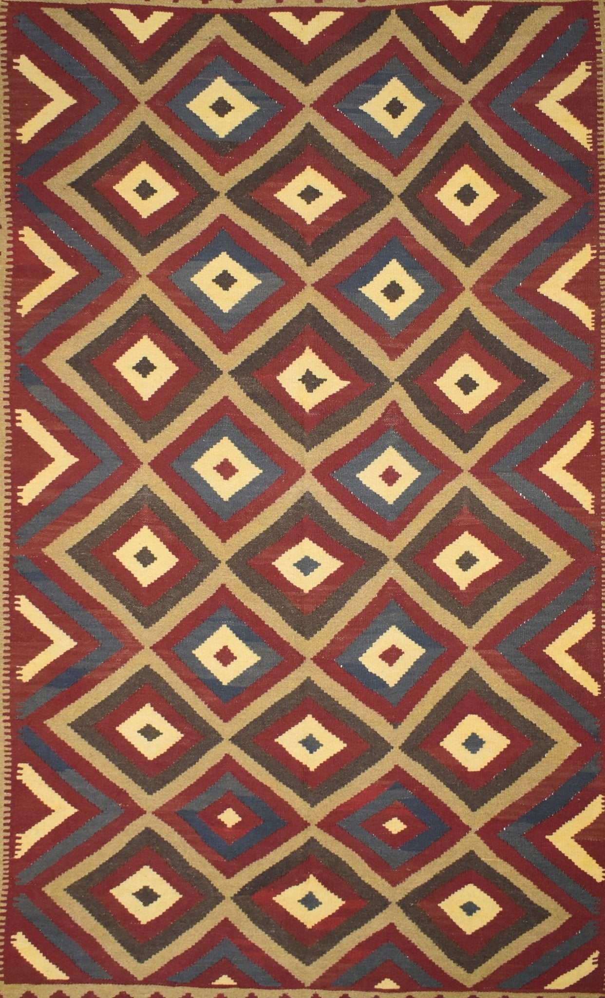 Handmade Afghan Maimana kilim rug featuring a repeating geometric diamond pattern in earthy tones.