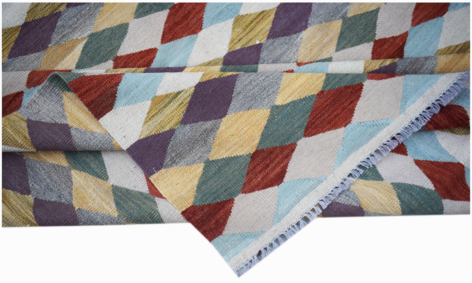 Handwoven Afghan Maimana kilim rug featuring a colorful geometric diamond pattern in wool.