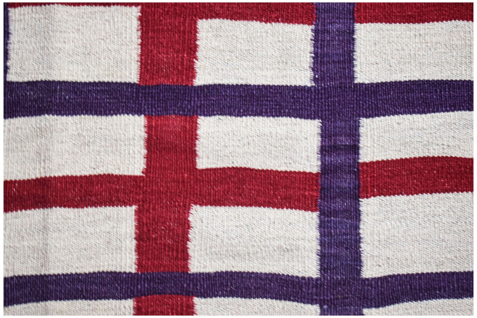 Afghan Maimana Kilim with a red, purple, and cream plaid pattern.