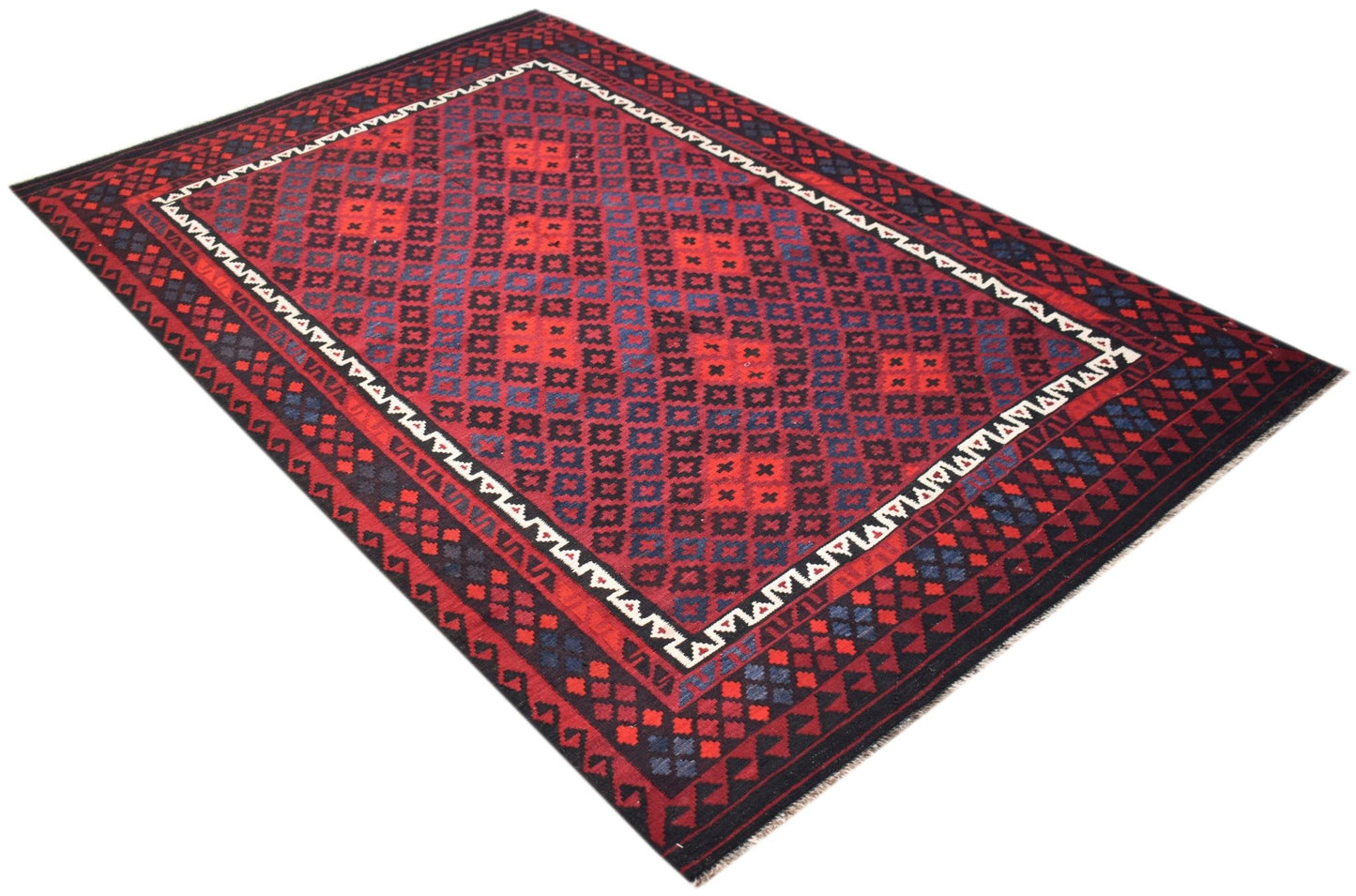 Handwoven Afghan Maimana kilim featuring a geometric diamond pattern in red and blue wool.