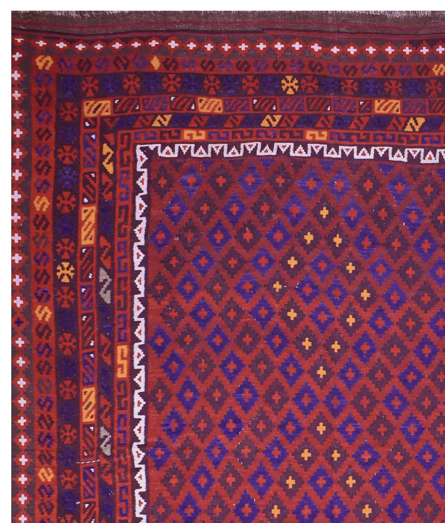 Handmade Afghan Maimana kilim rug featuring a geometric diamond pattern in red and blue tones.