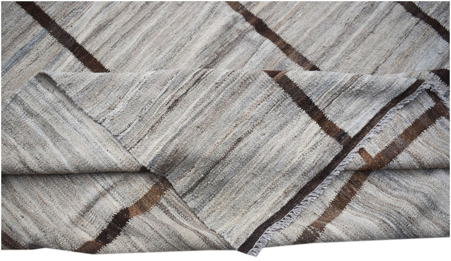 Afghan Maimana Kilim with diagonal brown stripes on a natural wool background.