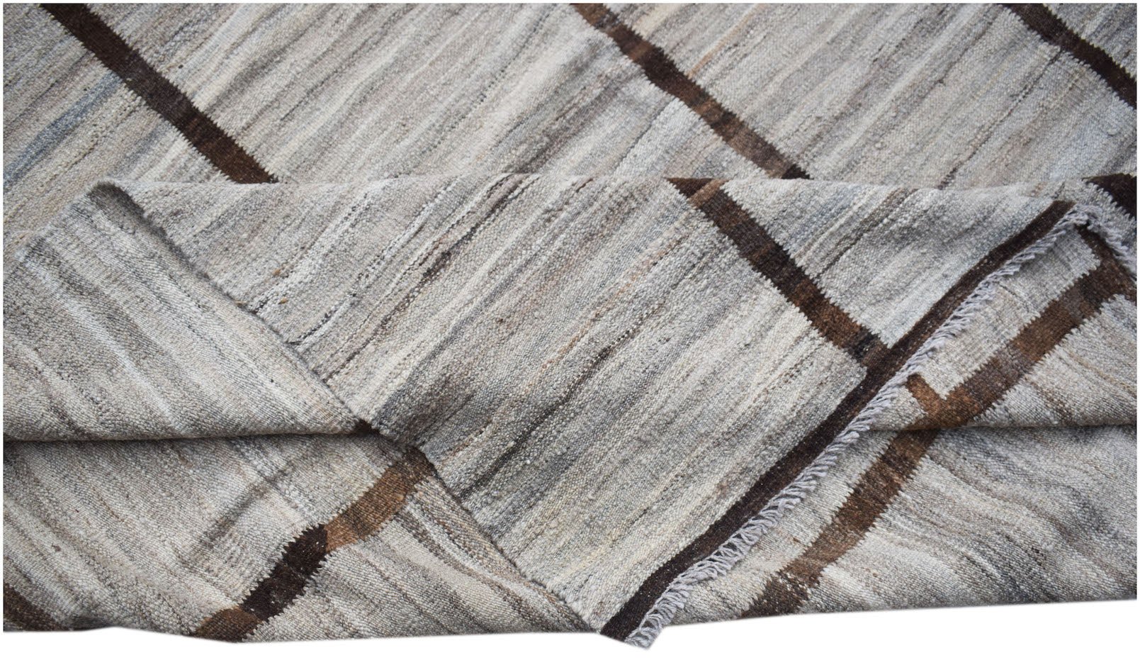 Afghan Maimana Kilim with diagonal brown stripes on a natural wool background.