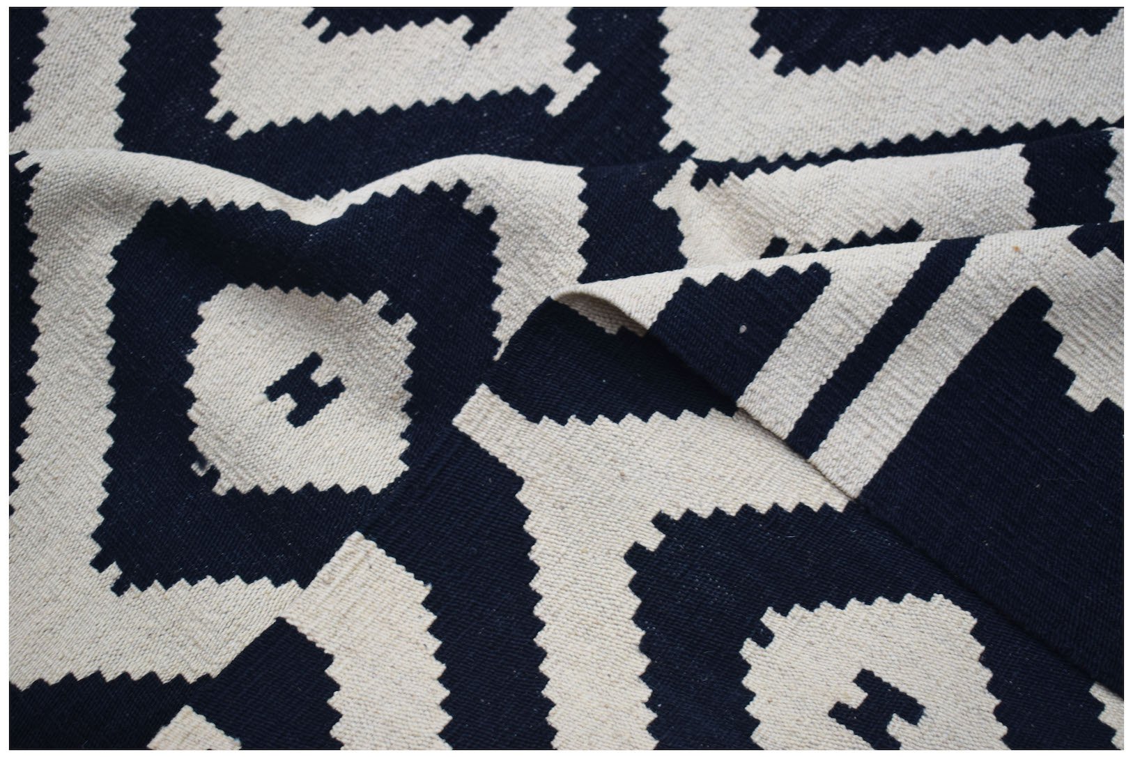 Afghan Maimana Kilim with a geometric pattern in navy and cream.
