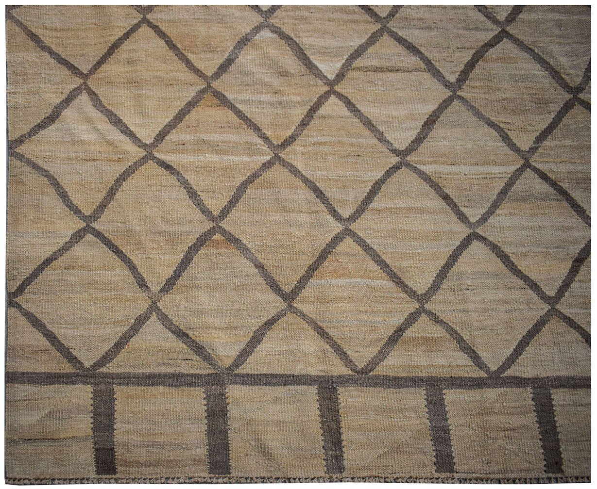 Handwoven Afghan Maimana kilim rug featuring a tan field with a dark brown diamond lattice pattern.