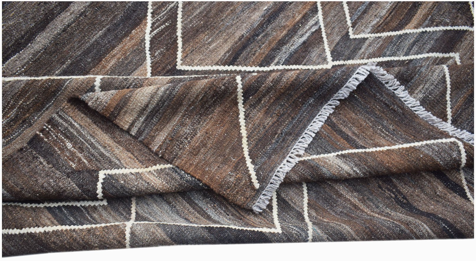 Handwoven Afghan Maimana kilim featuring a brown and grey geometric pattern in natural wool.