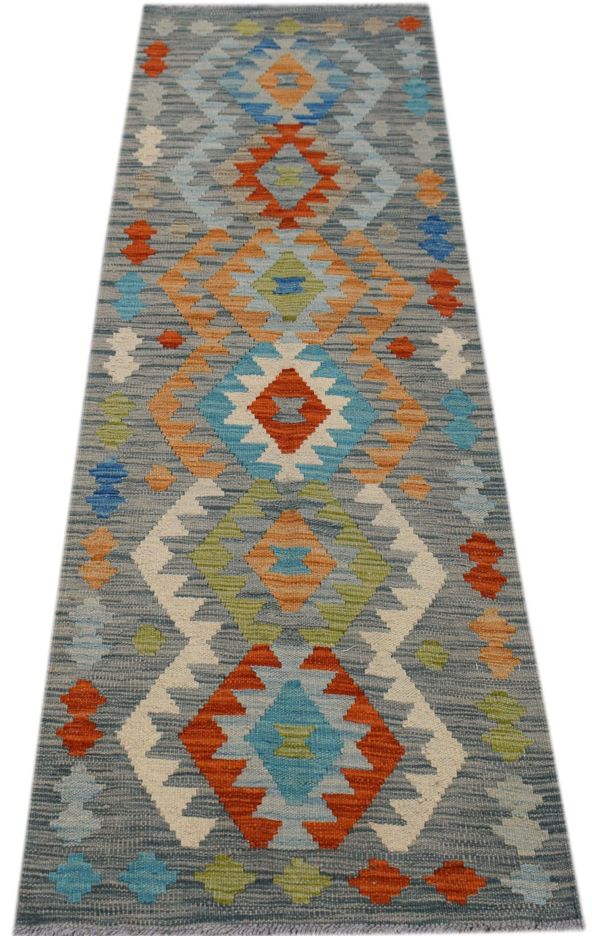 Handwoven Afghan Maimana wool runner featuring a geometric diamond pattern in blue, orange, and green.