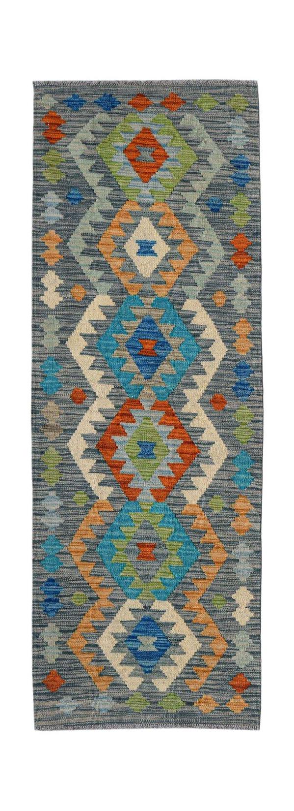 Handwoven Afghan Maimana wool runner rug featuring a colorful geometric diamond pattern.