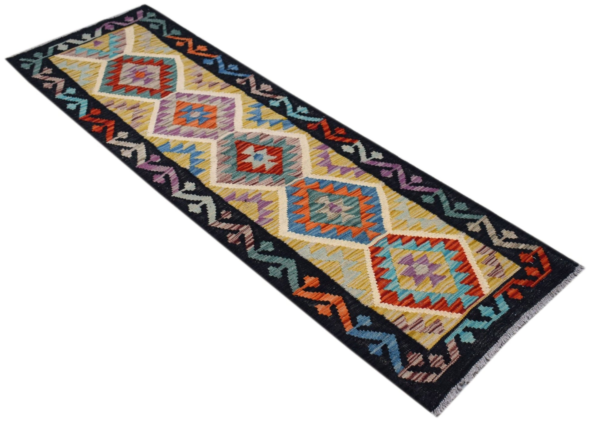 Handwoven Afghan Maimana wool runner featuring a colorful geometric diamond pattern.