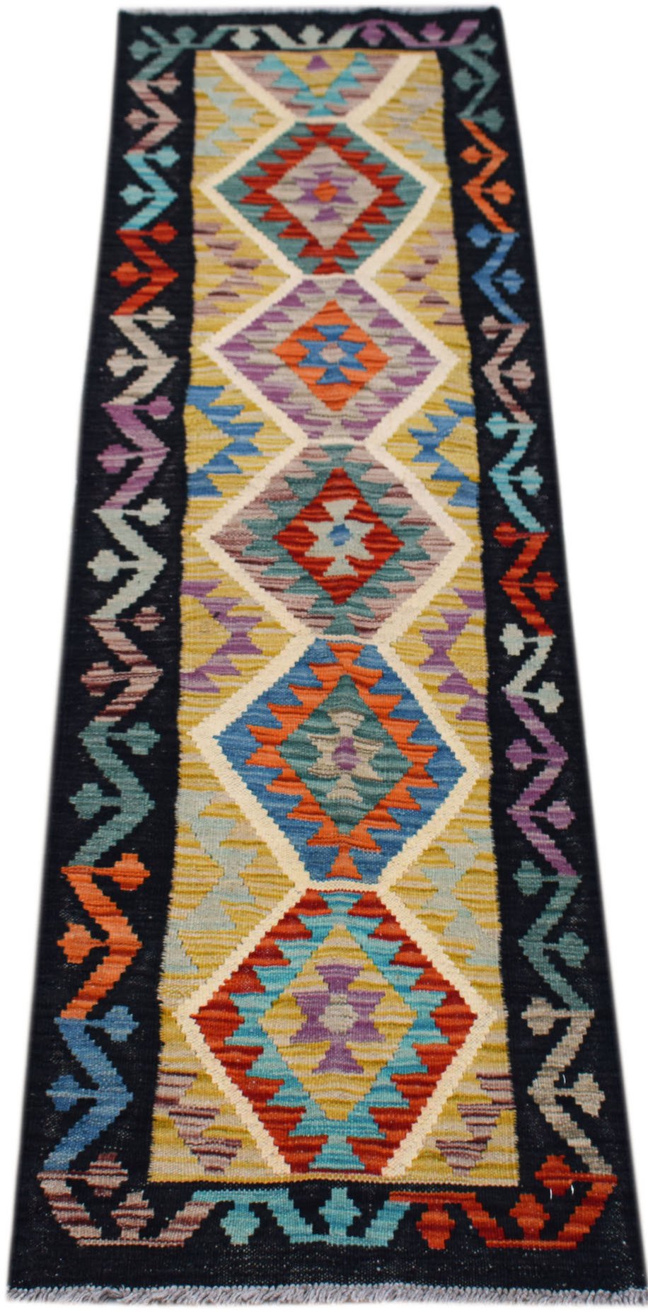 Handwoven Afghan Maimana wool runner featuring a colorful geometric diamond pattern.