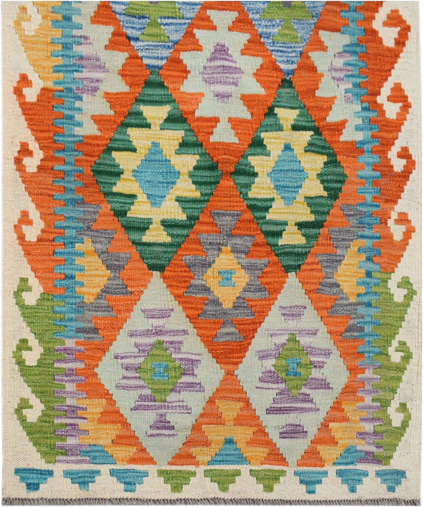 Handwoven Afghan Maimana wool runner featuring a vibrant geometric diamond pattern.