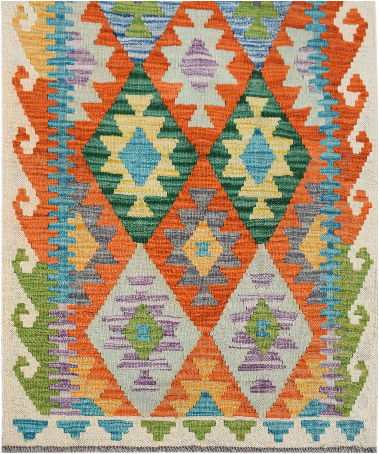 Handwoven Afghan Maimana wool runner featuring a vibrant geometric diamond pattern.