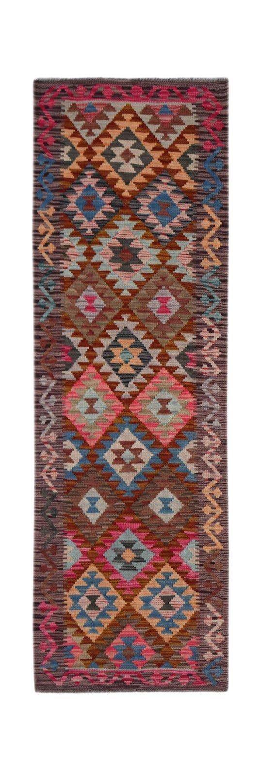 Handwoven Afghan Maimana wool runner rug featuring a colorful geometric diamond pattern.