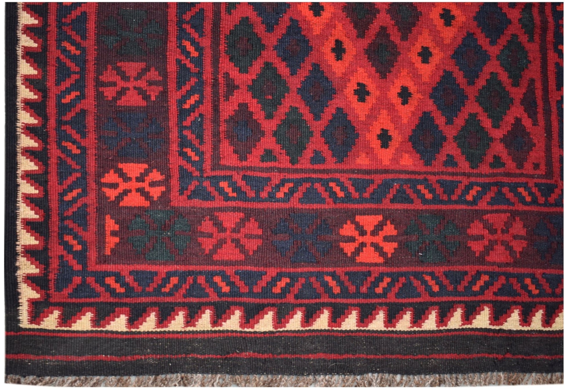 Handwoven Afghan Maimana kilim runner featuring a geometric diamond pattern in red and dark blue.