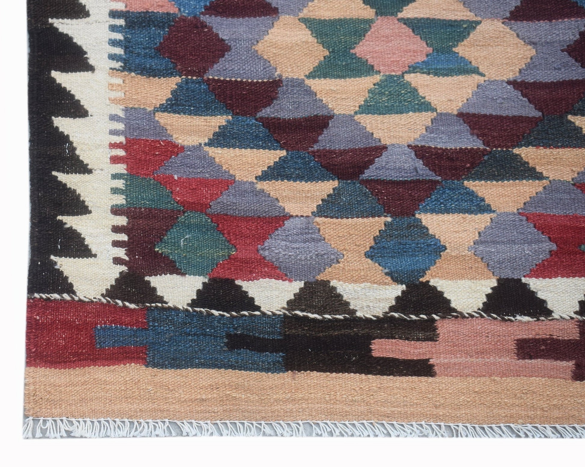Handwoven Afghan Maimana wool runner featuring a geometric diamond pattern in multicolored tones.