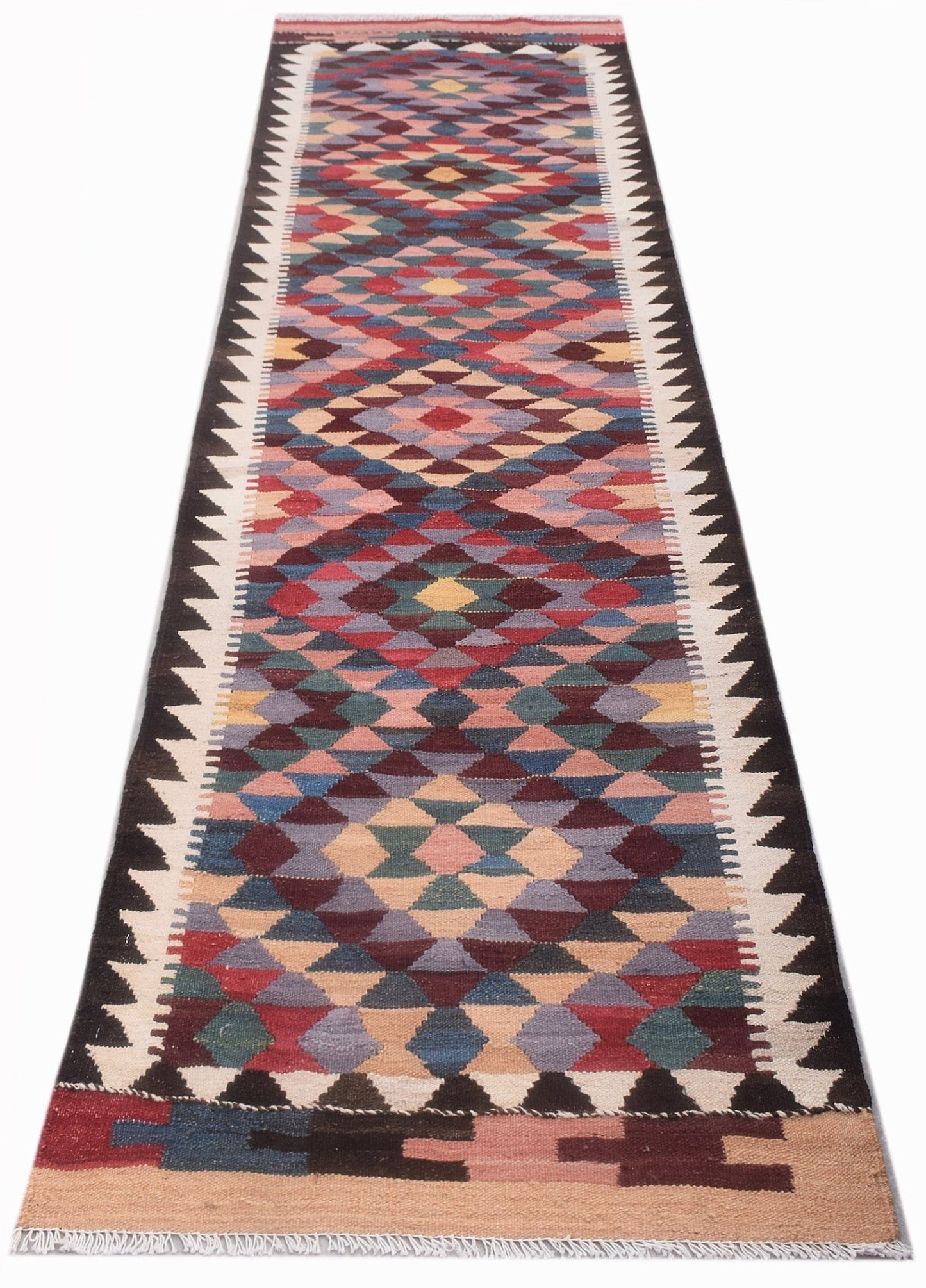 Handwoven Afghan Maimana wool runner featuring a colorful geometric diamond pattern.