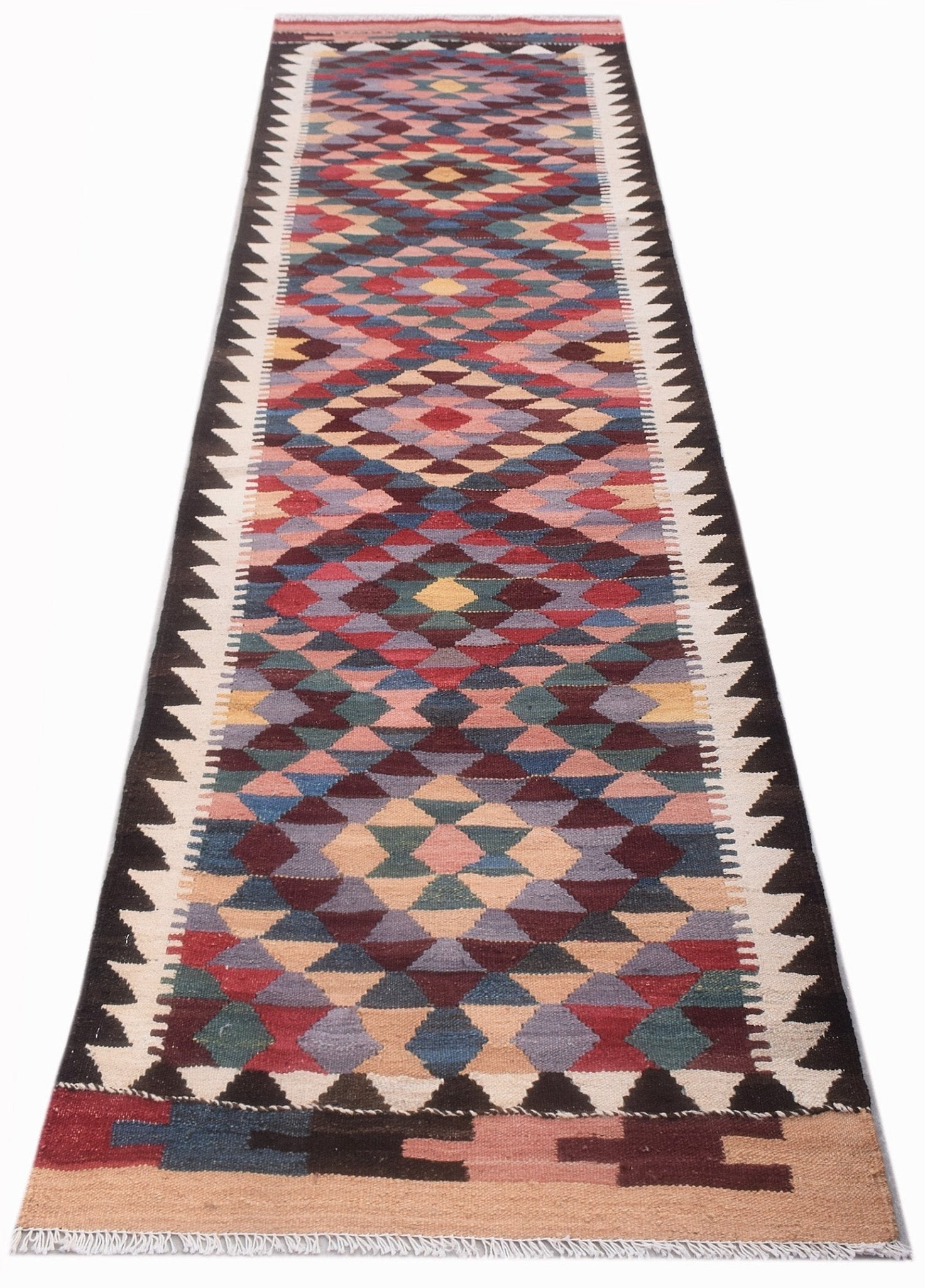 Handwoven Afghan Maimana wool runner featuring a colorful geometric diamond pattern.
