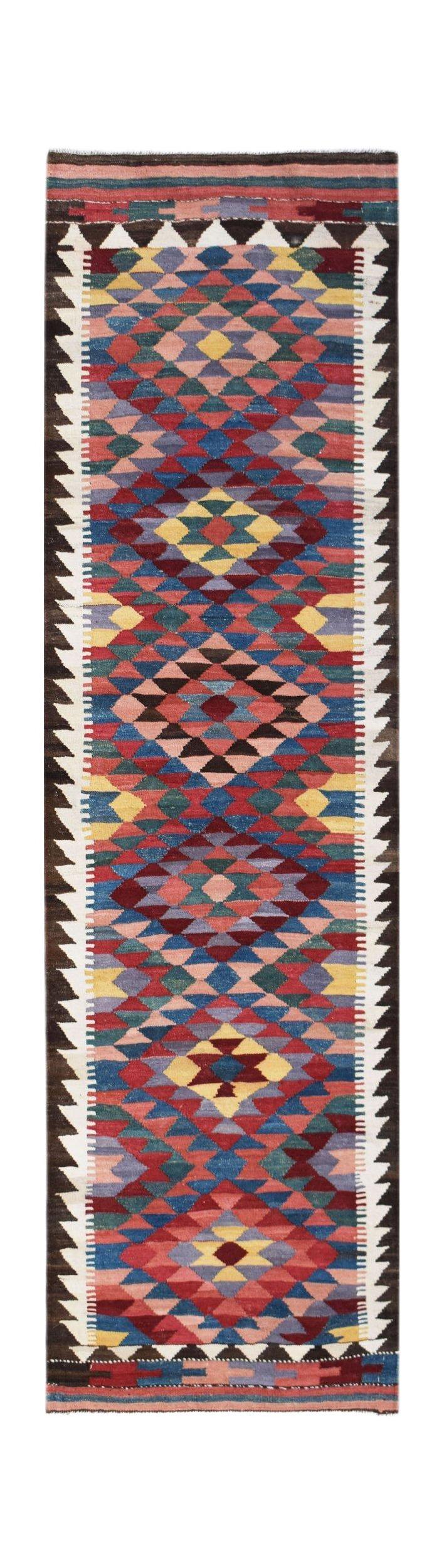 Handwoven Afghan Maimana wool runner featuring a colorful geometric diamond pattern.