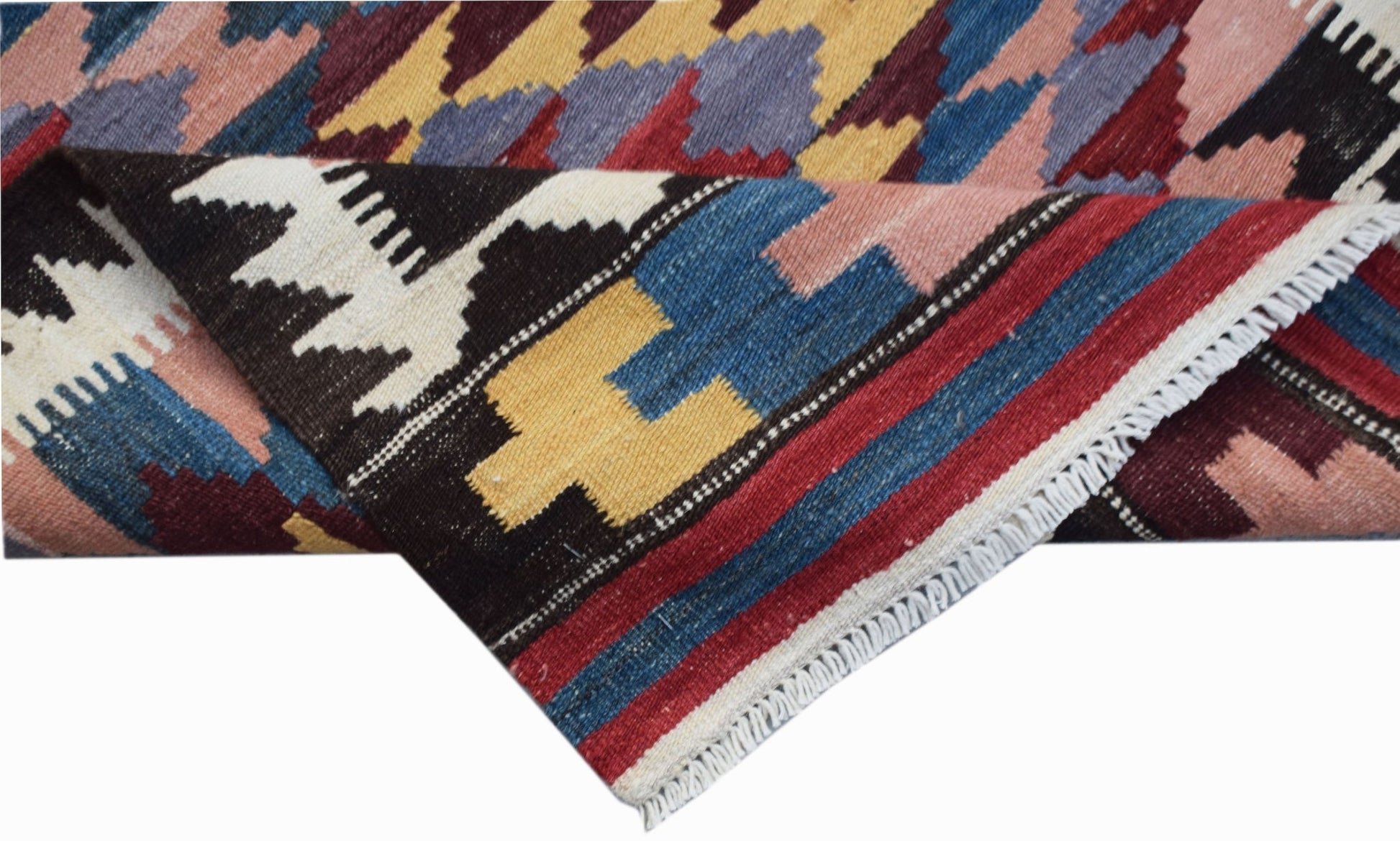 A handmade Afghan Maimana kilim runner featuring a geometric pattern in vibrant wool colors.