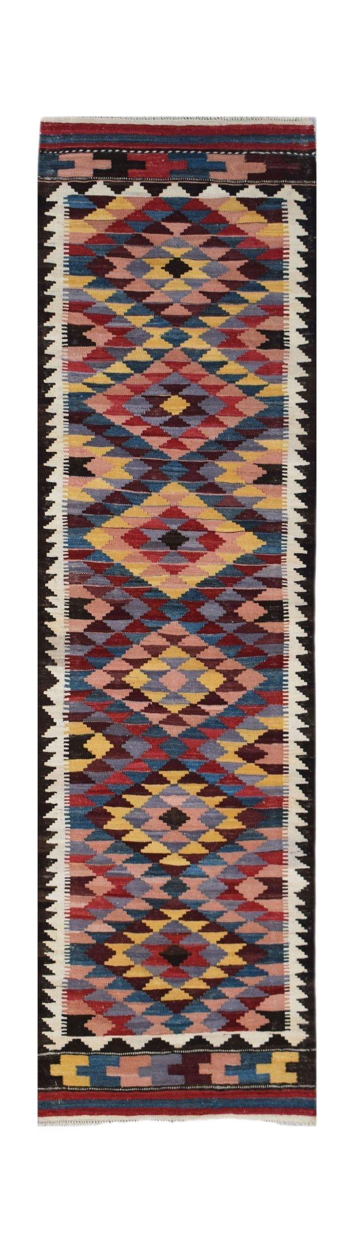 Handwoven Afghan Maimana wool runner rug featuring a colorful geometric diamond pattern.