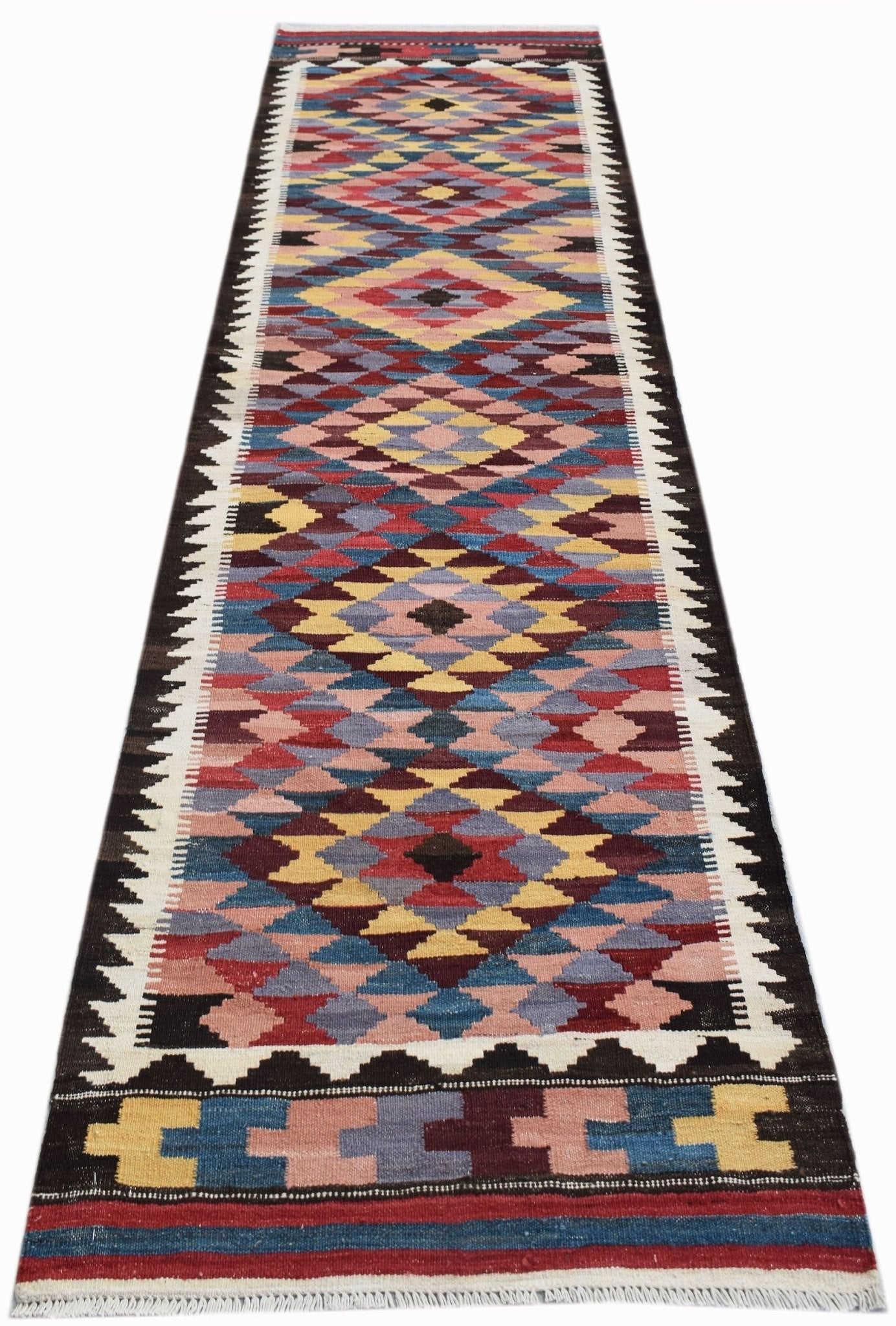 Handwoven Afghan Maimana wool runner featuring a colorful geometric diamond pattern.