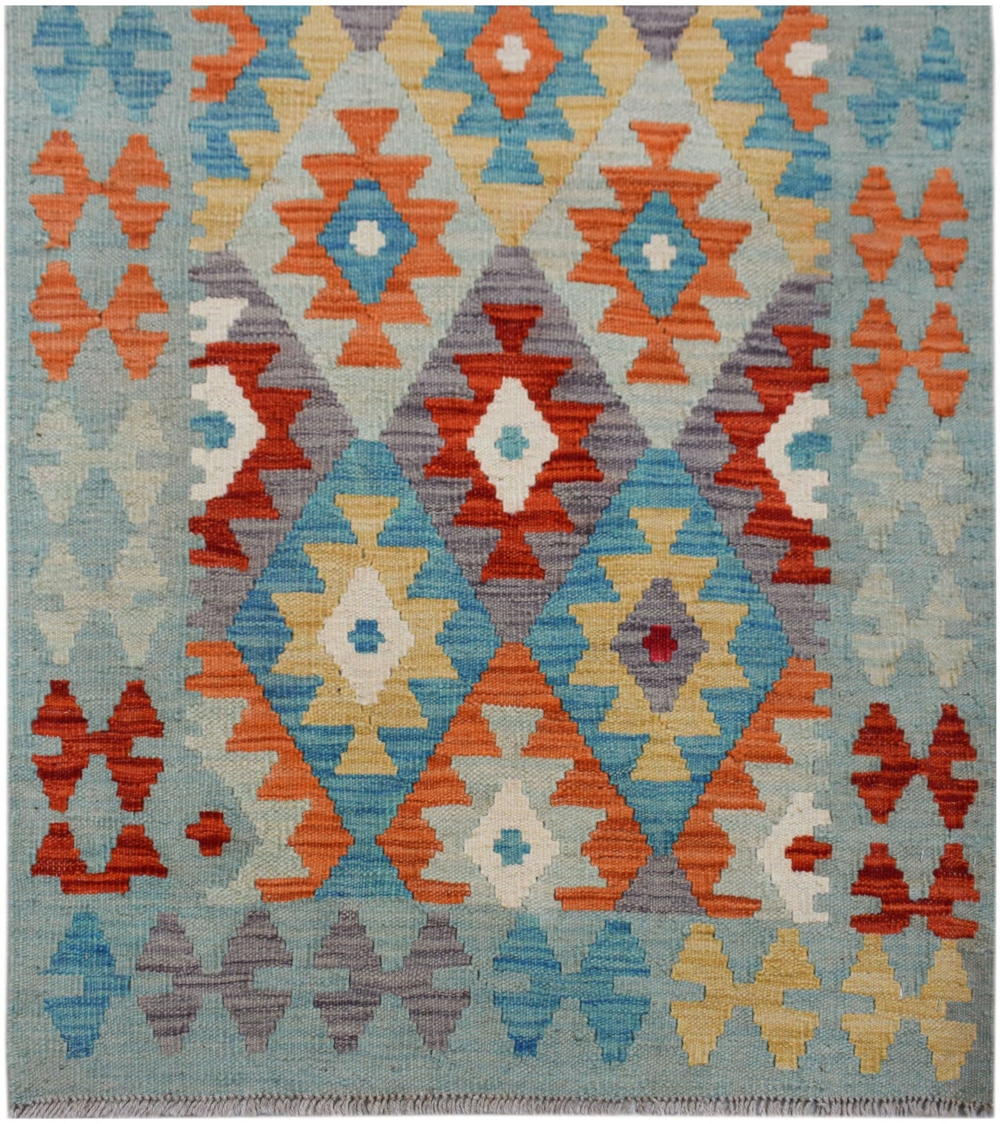 Handwoven Afghan Maimana wool runner rug featuring a geometric diamond pattern in vibrant colors.