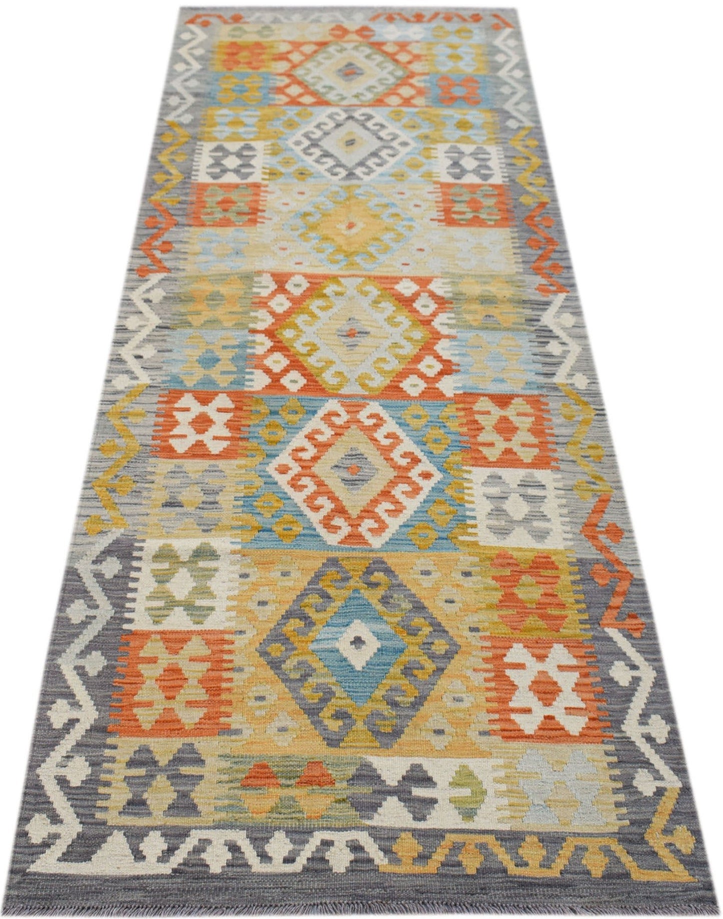 Handwoven Afghan Maimana wool runner rug featuring a colorful geometric pattern.