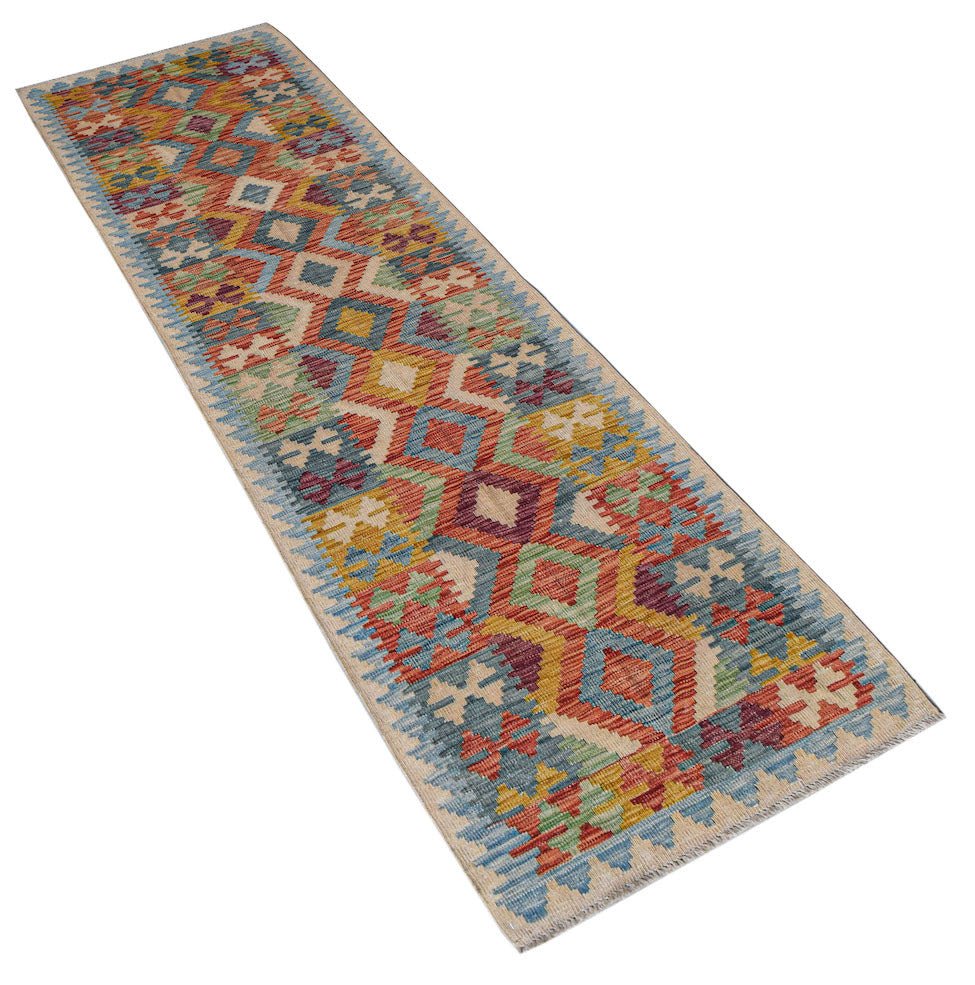 Handwoven Afghan Maimana wool runner rug featuring a colorful geometric diamond pattern.