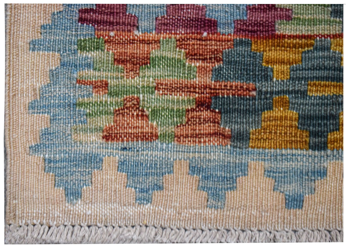 Afghan Maimana Kilim runner with geometric patterns in blue, red, green, and yellow.