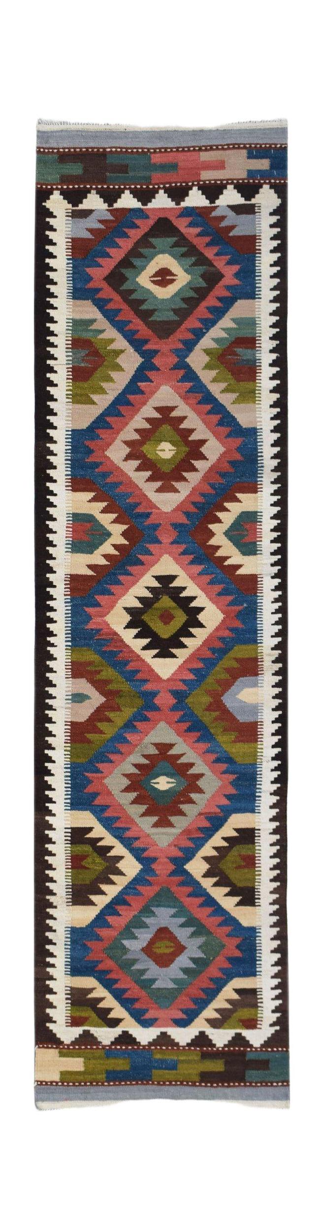 Handwoven Afghan Maimana wool runner rug featuring a colorful geometric diamond pattern.