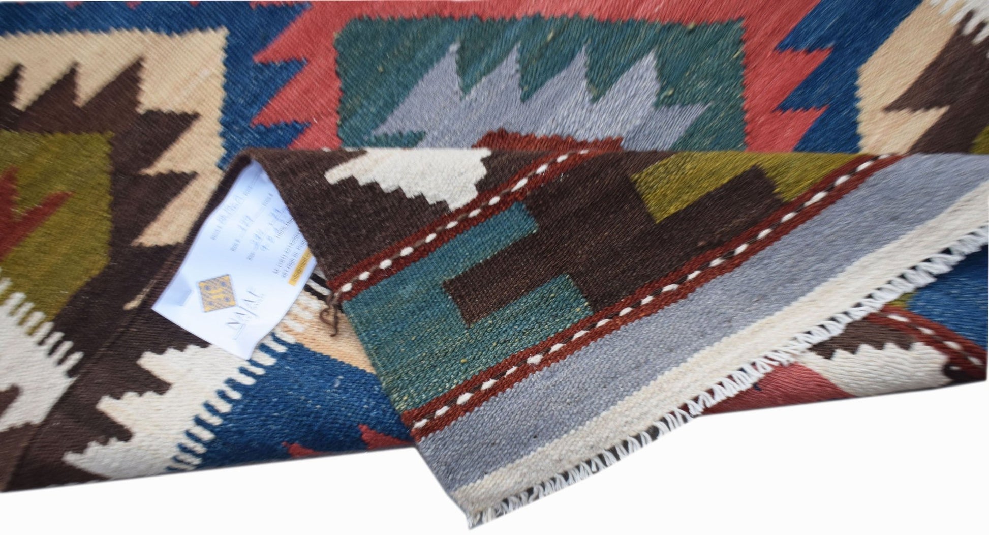 Handwoven Afghan Maimana wool kilim runner featuring a colorful geometric pattern.