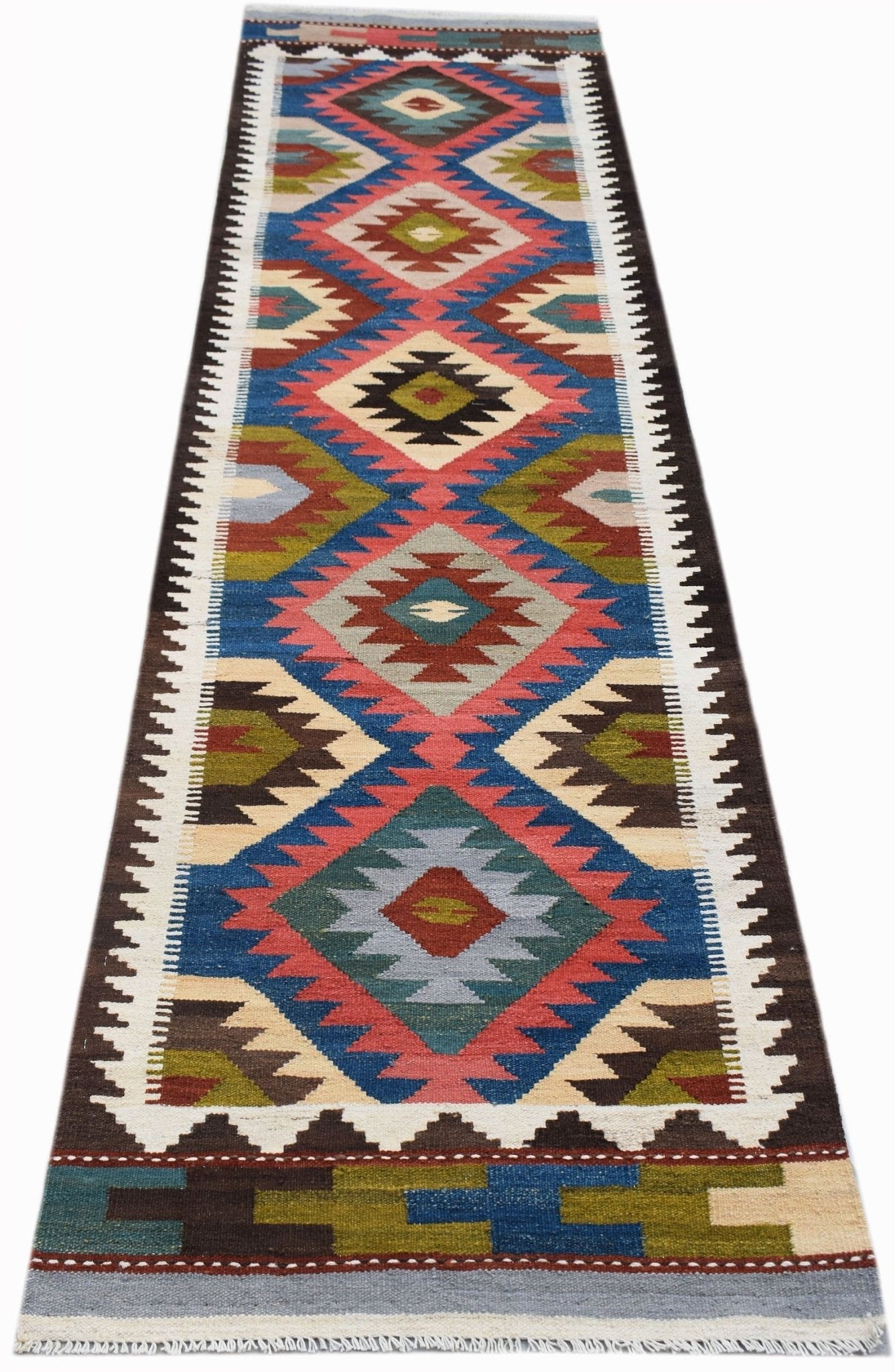 Handwoven Afghan Maimana wool runner rug featuring a colorful geometric diamond pattern.