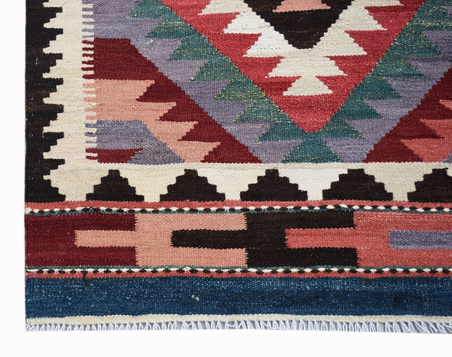 Handwoven Afghan Maimana wool kilim runner featuring a geometric pattern in red, blue, and cream.