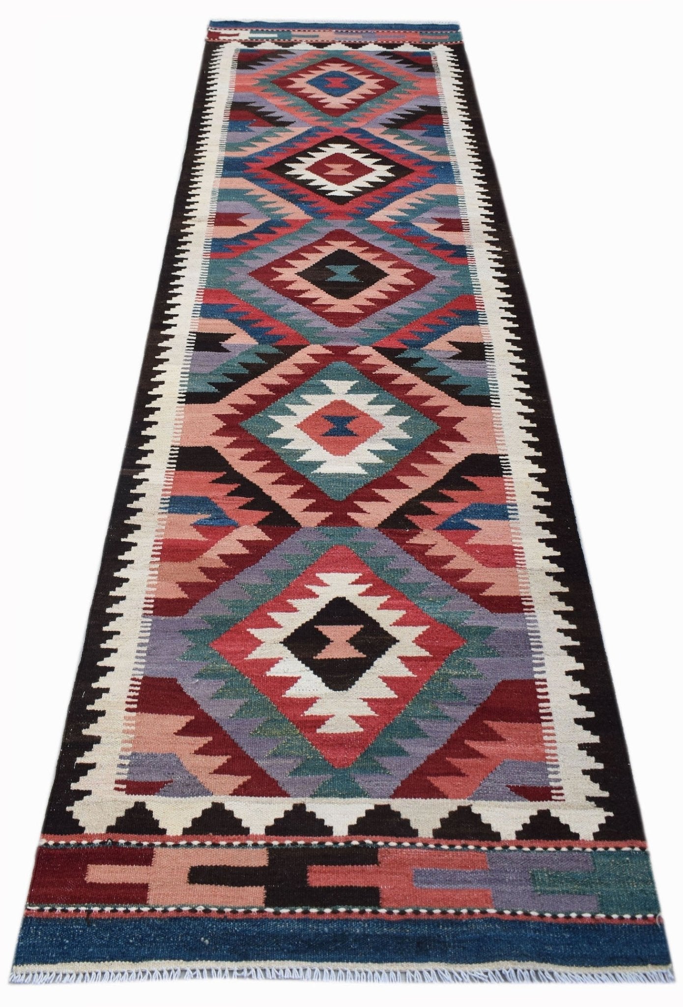 Handwoven Afghan Maimana wool runner featuring a colorful geometric diamond pattern.