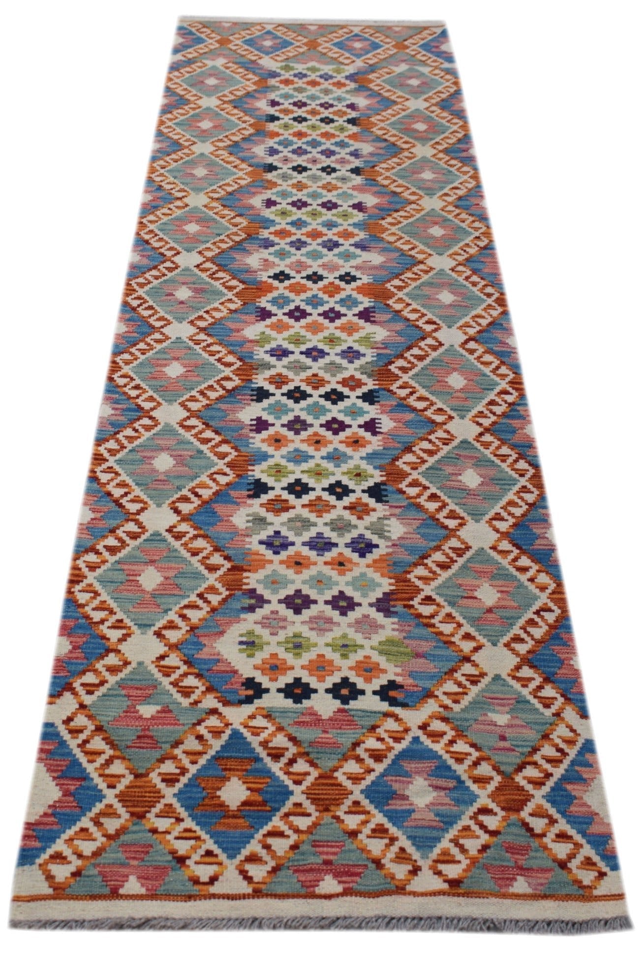 Handwoven Afghan Maimana wool runner rug featuring a colorful geometric diamond pattern.