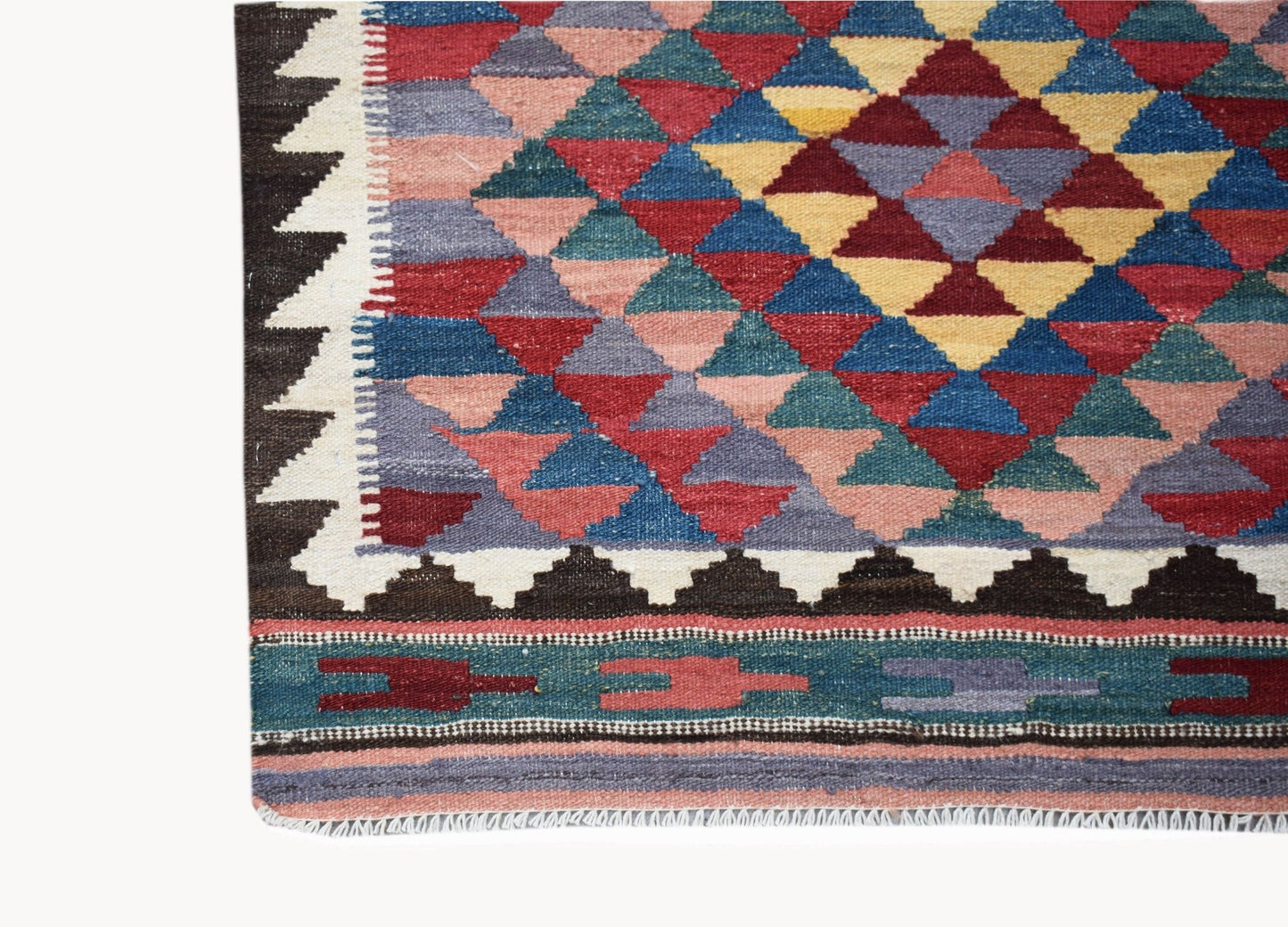 Handwoven Afghan Maimana wool runner featuring a colorful geometric diamond pattern.