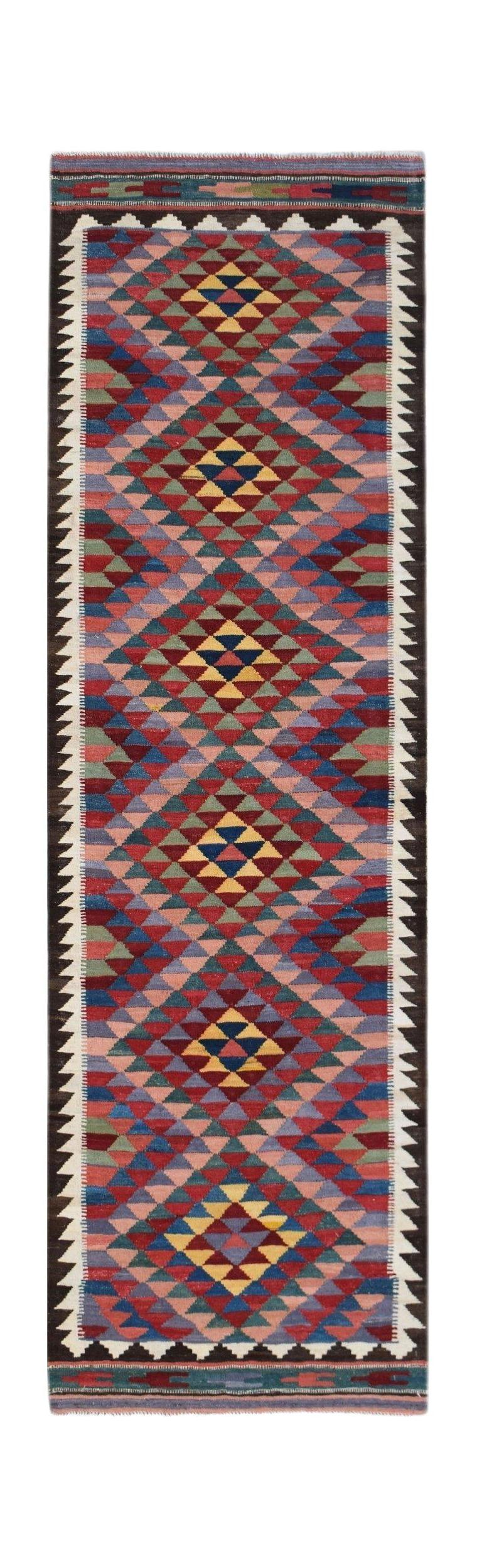 Handwoven Afghan Maimana wool runner featuring a colorful geometric diamond pattern.