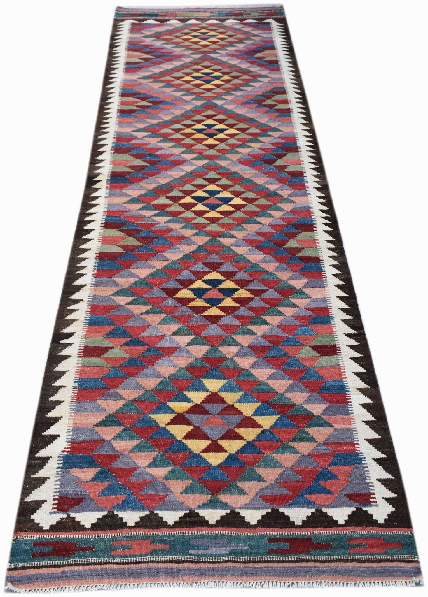 Handwoven Afghan Maimana wool runner featuring a colorful geometric diamond pattern.